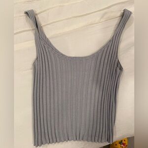 Gray tank. Thicker straps. Fits like a small/medium